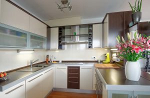 A small, cream kitchen installation